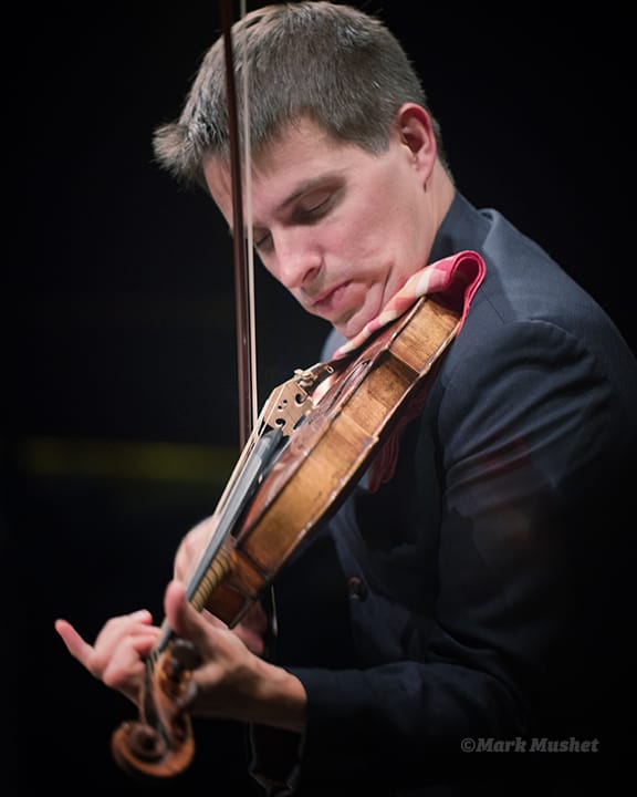 Mathieu van Bellen playing violin with the Busch Trio